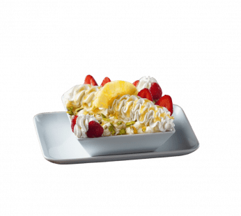 Obstsalat mit Creme und Honig